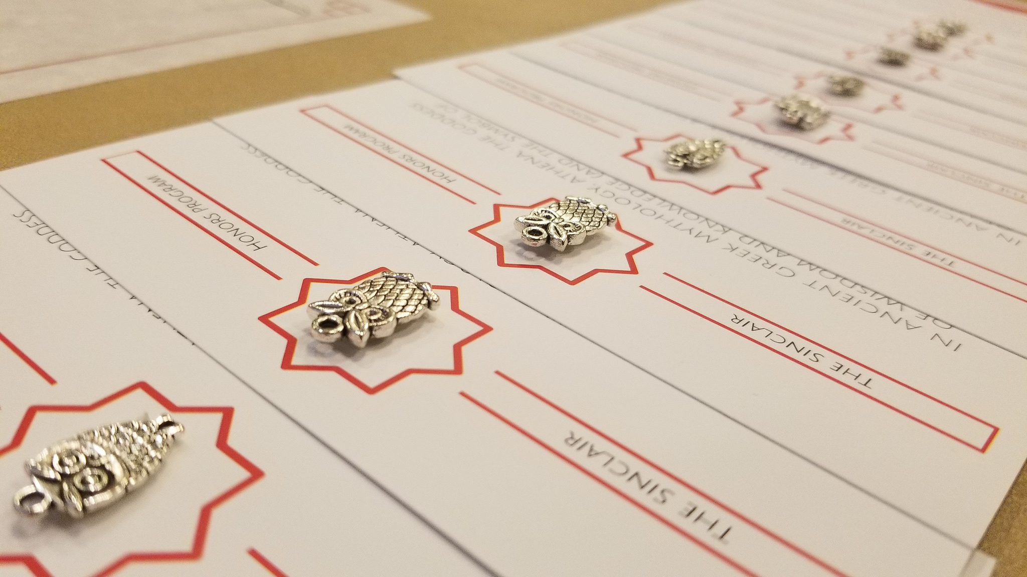 small silver initiate pins