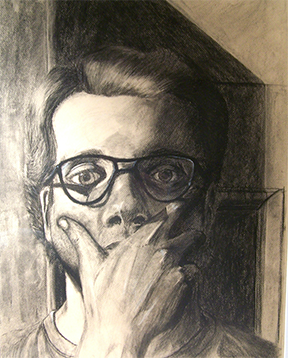 A graphite drawing of a man’s face and upper shoulders. His hand is covering his mouth in a thoughtful manner. The left side of his face is in bright light and there is a linear shadow in the background. A vertical wall meets the line of his shirt collar and a doorway’s horizontal points to the shadows under his eyes. He’s wearing glasses and has a kempt appearance. There is heightened contrast from a single light source on the left.