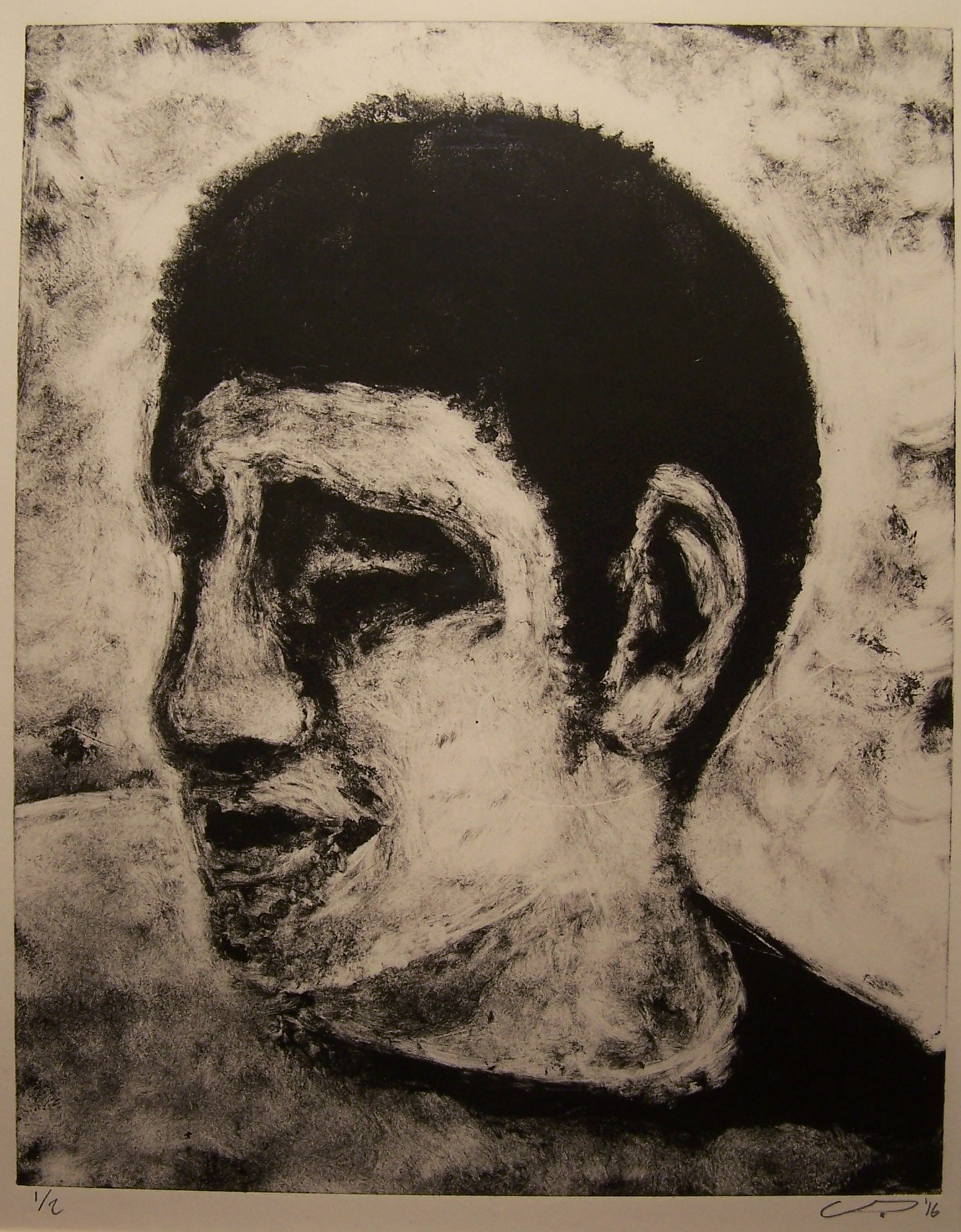 A black ink print of a man’s portrait. He is looking to the left between a profile and a ¾ view. The print is activated by the uneven ink transfer throughout the piece, particularly in the lighter areas. His eye socket is particularly large and dark with an interior light shape gives the effect of his eyelids being closed from far away. He has short dark hair and his right shoulder is higher than his left.